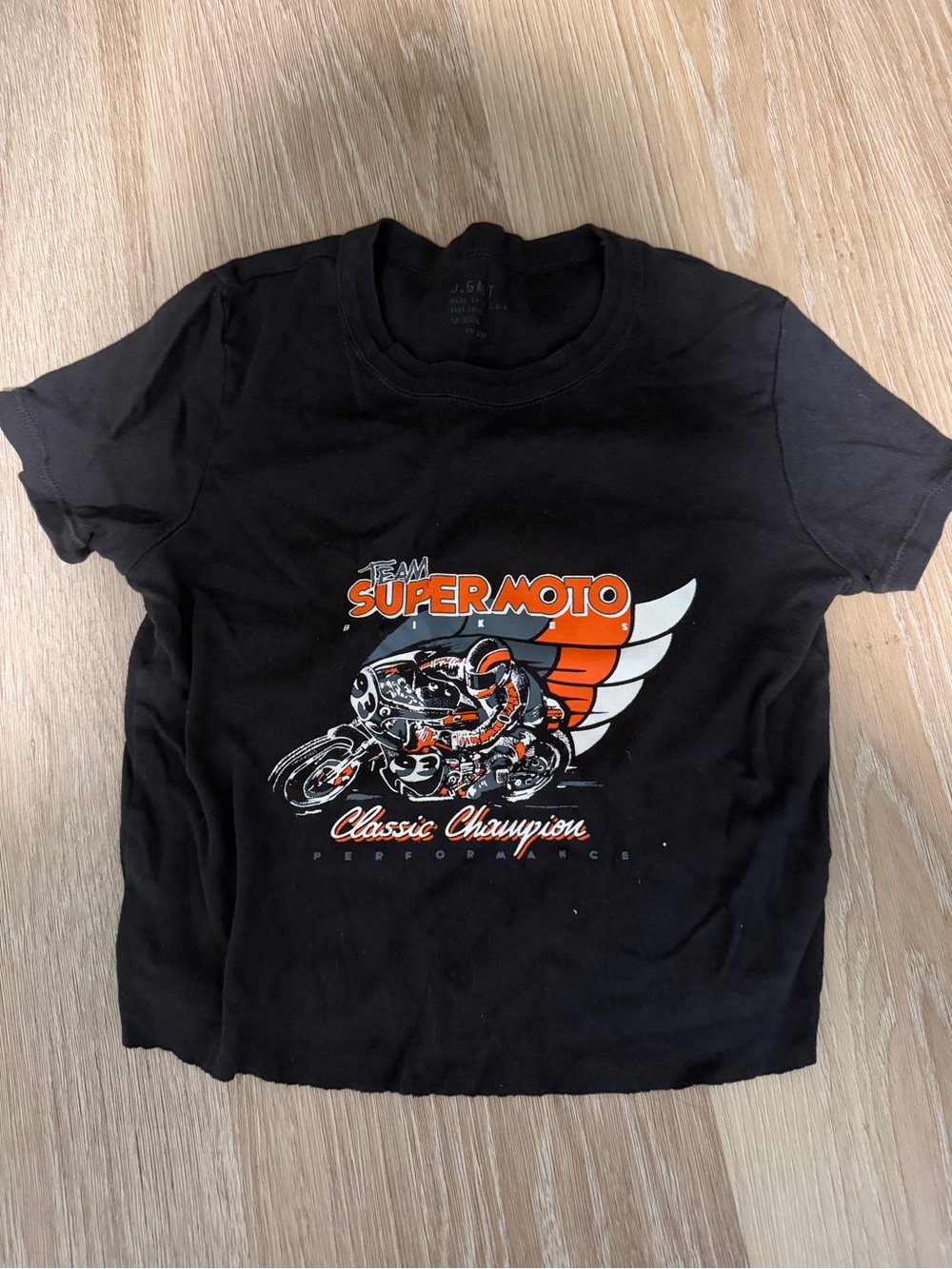 Brandy Melville Black Graphic 'Super Moto' Tee with Orange & White Print
